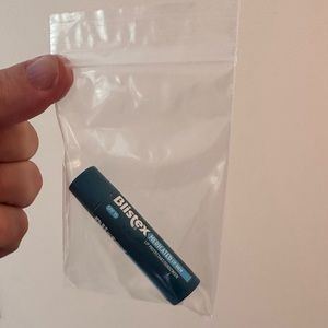 Partially used Chapstick Blistex medicated lip balm well worn